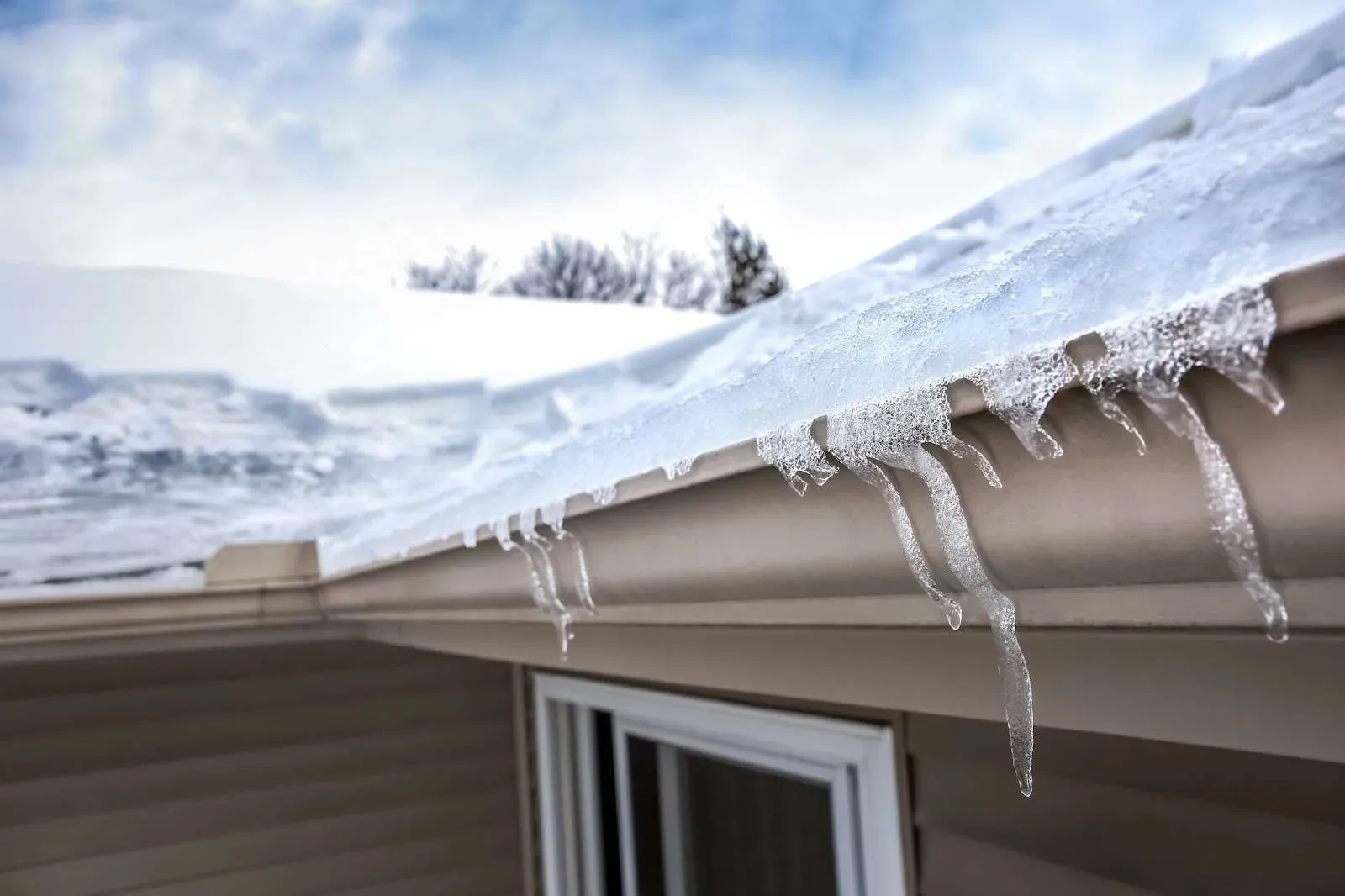 Ice Dams 101: What Are They, Causes, How To Prevent in Gutters, Etc.